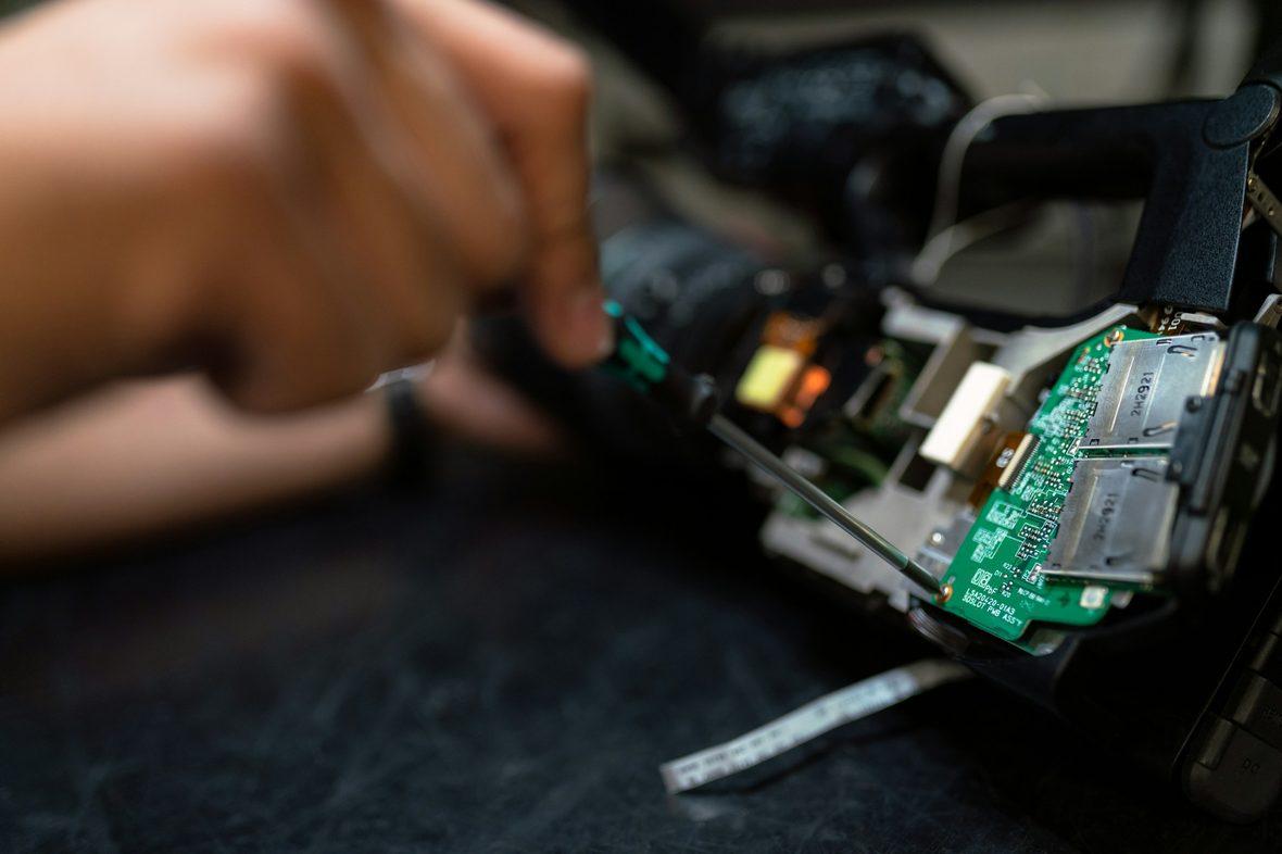 Hands assembling a sensor board