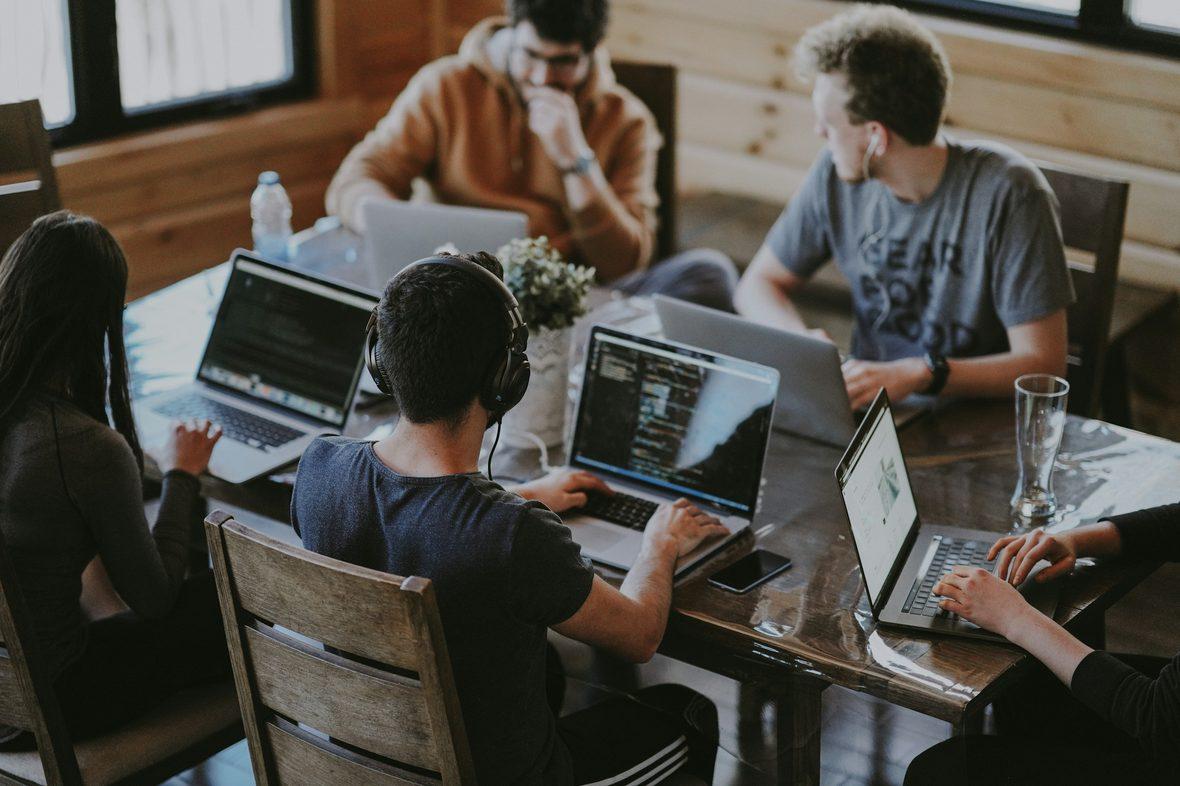 A development team working through a build together